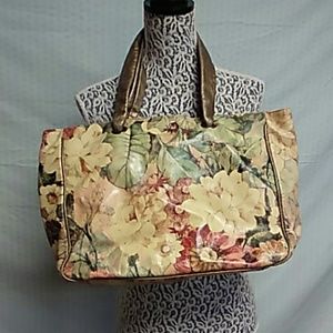 Maurizio taiuti leather flower purse